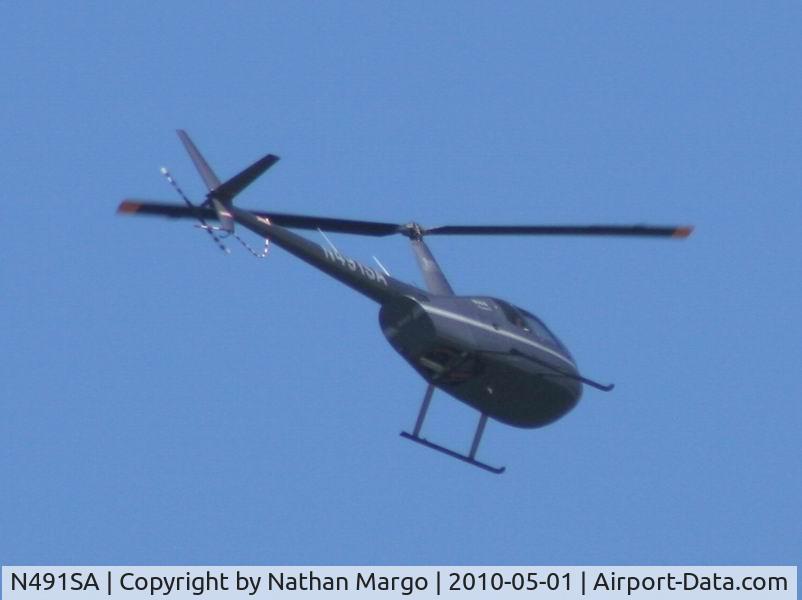 N491SA, Robinson R44 II C/N 12831, Seen flying over O.B. Pier, San Diego, CA