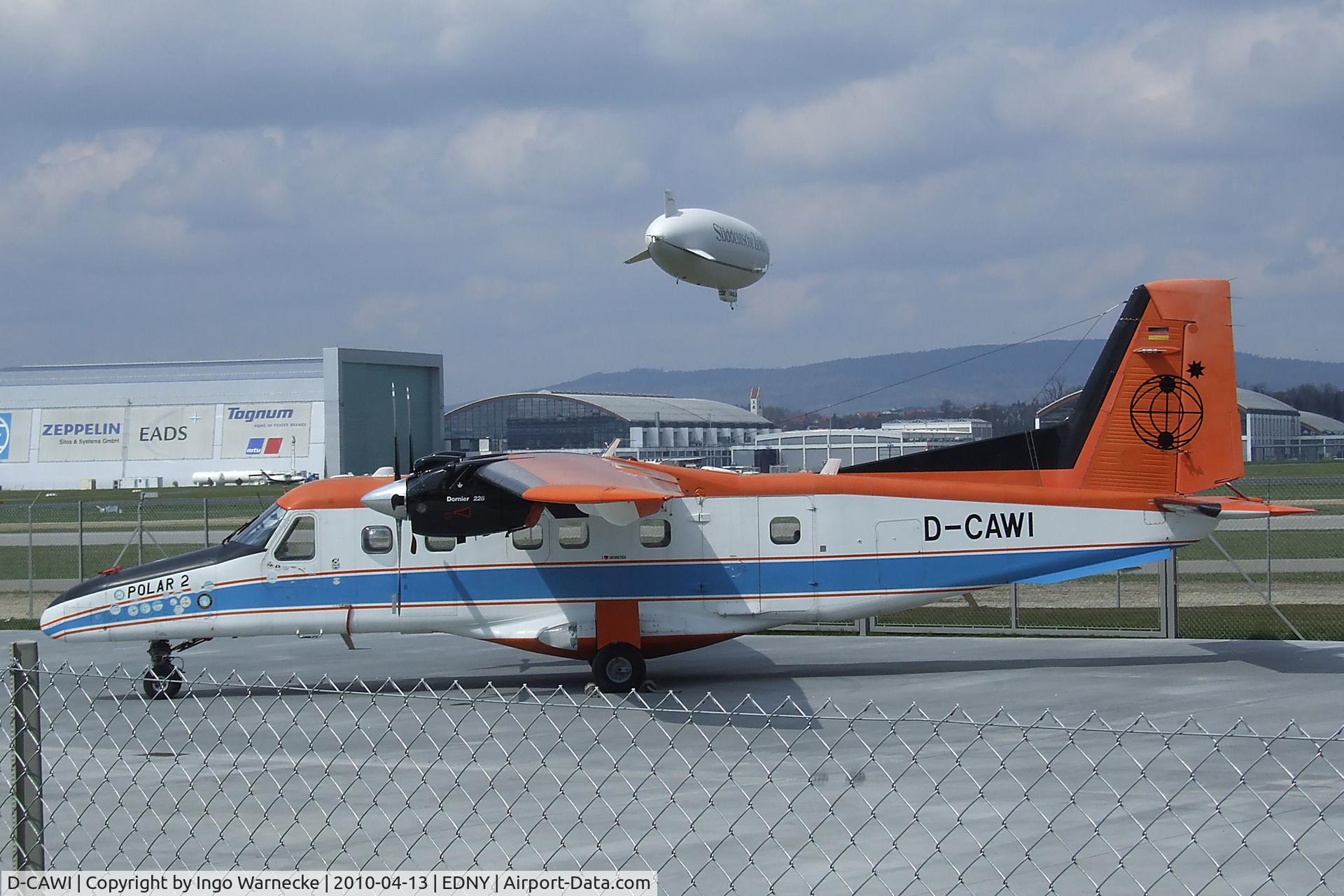 D-CAWI, 1983 Dornier 228-101 C/N 7014, Dornier Do 228-101 (formerly 'POLAR 2' operated by the German polar research institute (Alfred Wegener Institut)) standing outside the Dornier-Museum to be sold in May 2010. Before it had been exhibited at the Dornier Museum for some months.