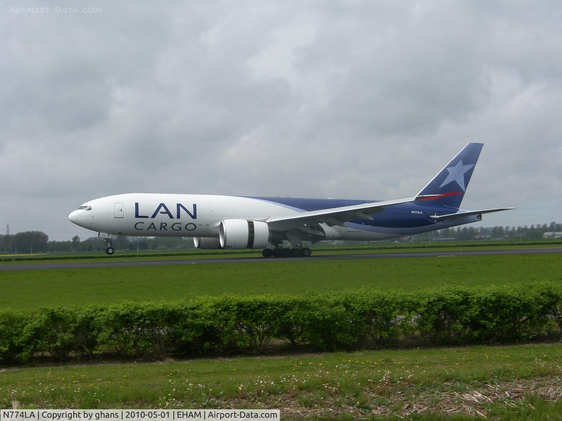 N774LA, 2009 Boeing 777-F6N C/N 37710, Landing on the 18R
