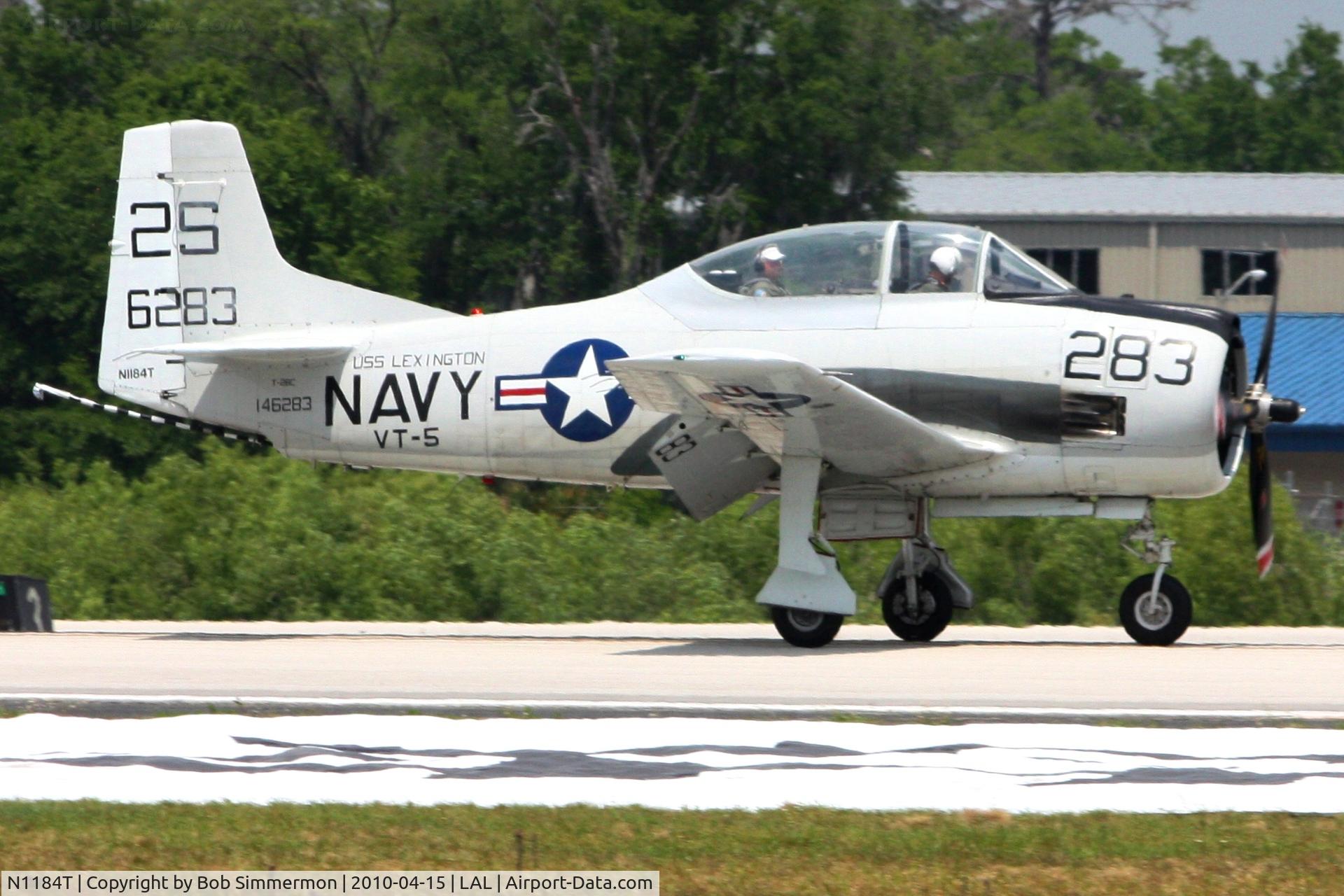 N1184T, 1958 North American T-28C Trojan C/N 252-46 (146283), Departing Lakeland, FL during Sun N Fun 2010