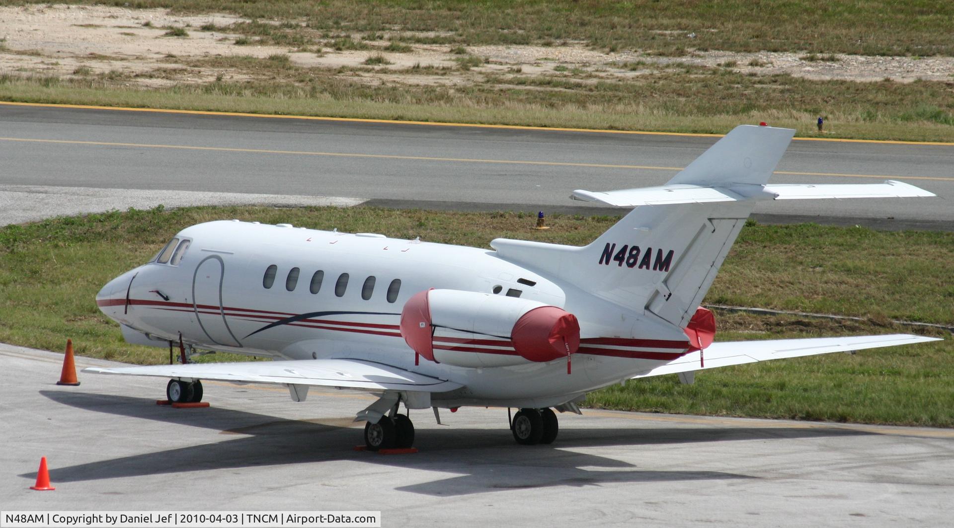 N48AM, 2002 Raytheon Hawker 800XP C/N 258582, N48AM park at the cargo ramp at TNCM