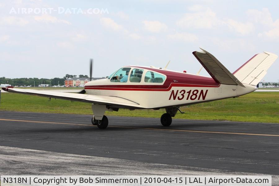 N318N, 1964 Beech S35 Bonanza C/N D-7486, Departing Lakeland, FL during Sun N Fun 2010