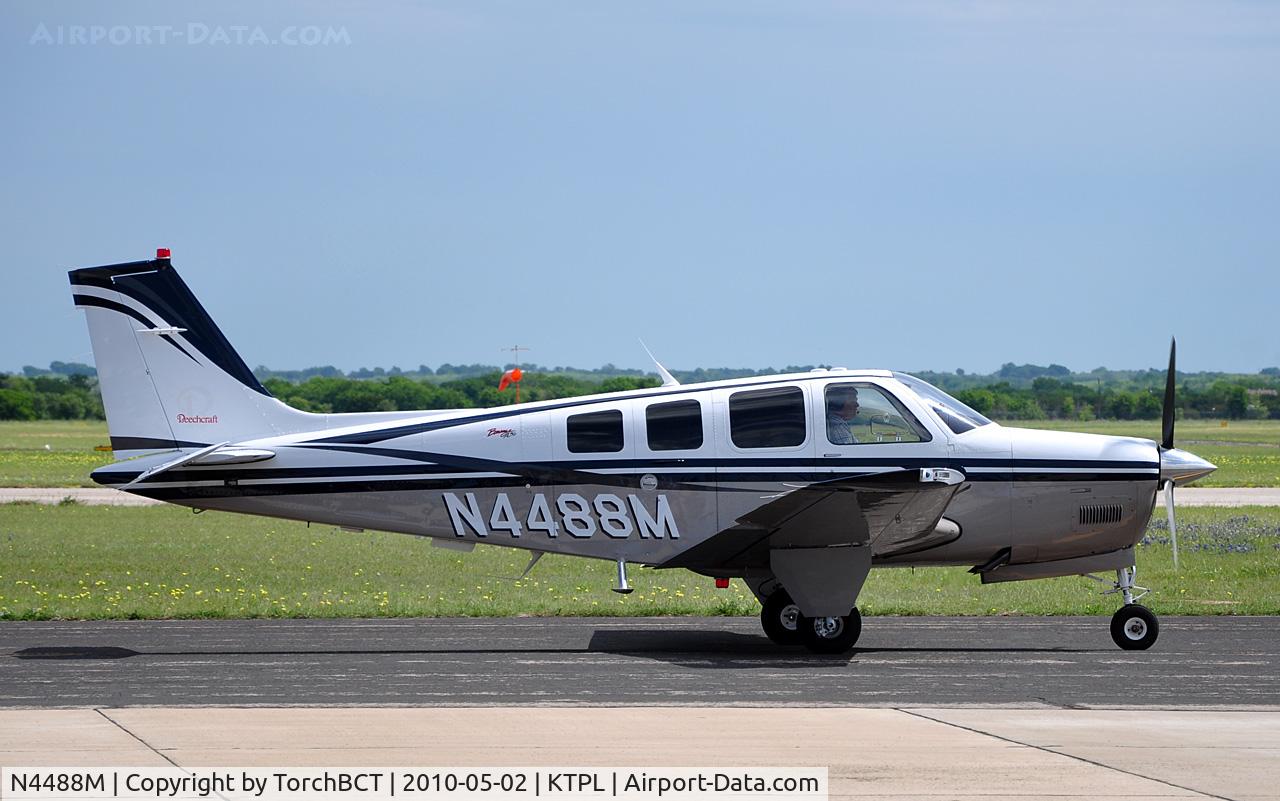 N4488M, 2004 Beech A36 Bonanza 36 C/N E-3568, Beechcraft Bonanza taxiing by at Central Texas airshow '10.