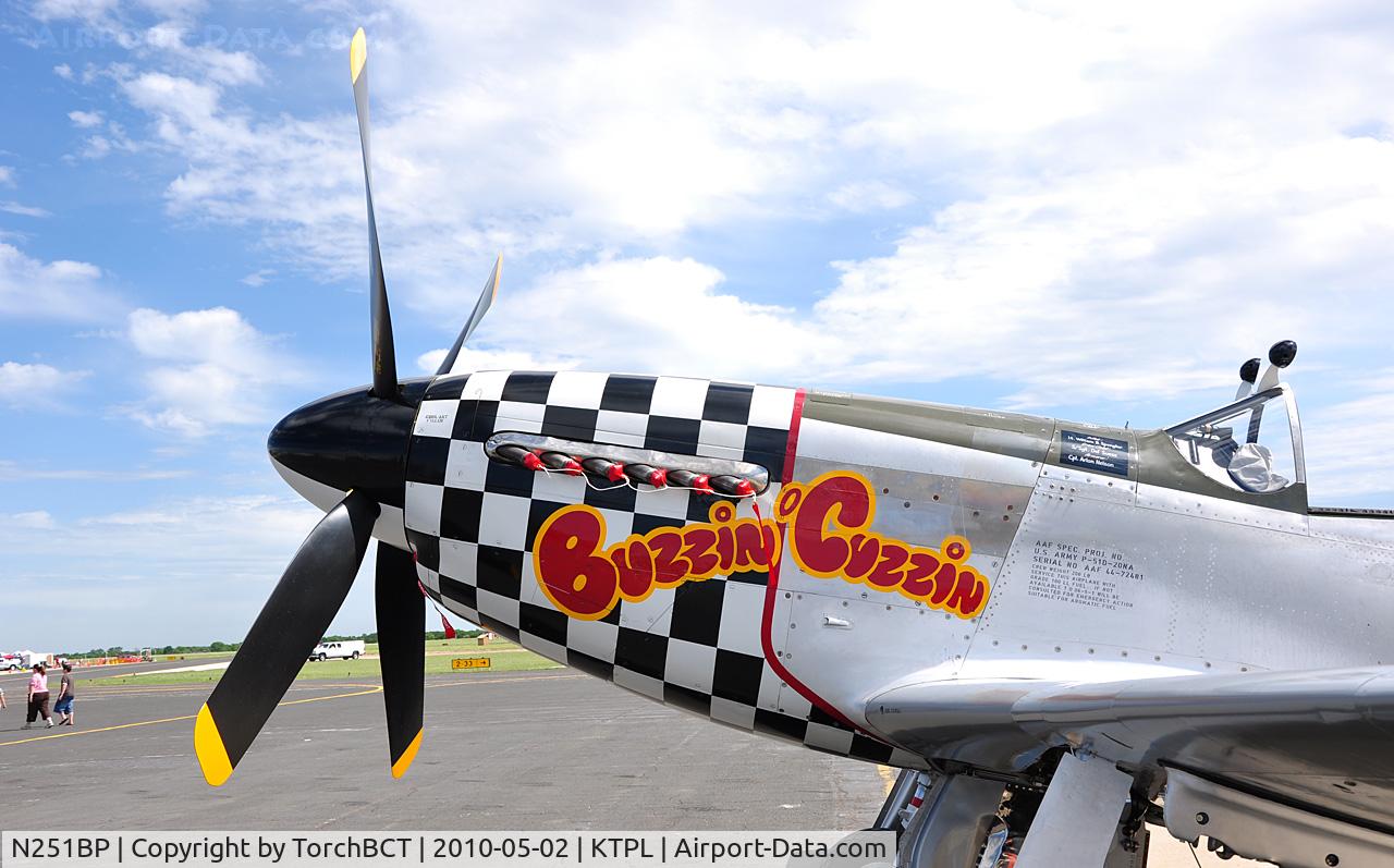 N251BP, 1944 North American P-51D Mustang C/N 44-84753, 'Buzzin Cuzzin' nose art on Mustang.