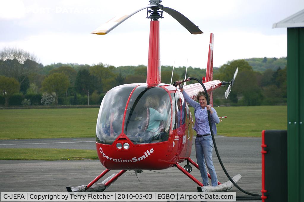 G-JEFA, 2000 Robinson R44 Clipper C/N 0710, 2000 Robinson Helicopter Co Inc ROBINSON R44 refeuling at Wolverhampton on 2010 Wings and Wheels Day