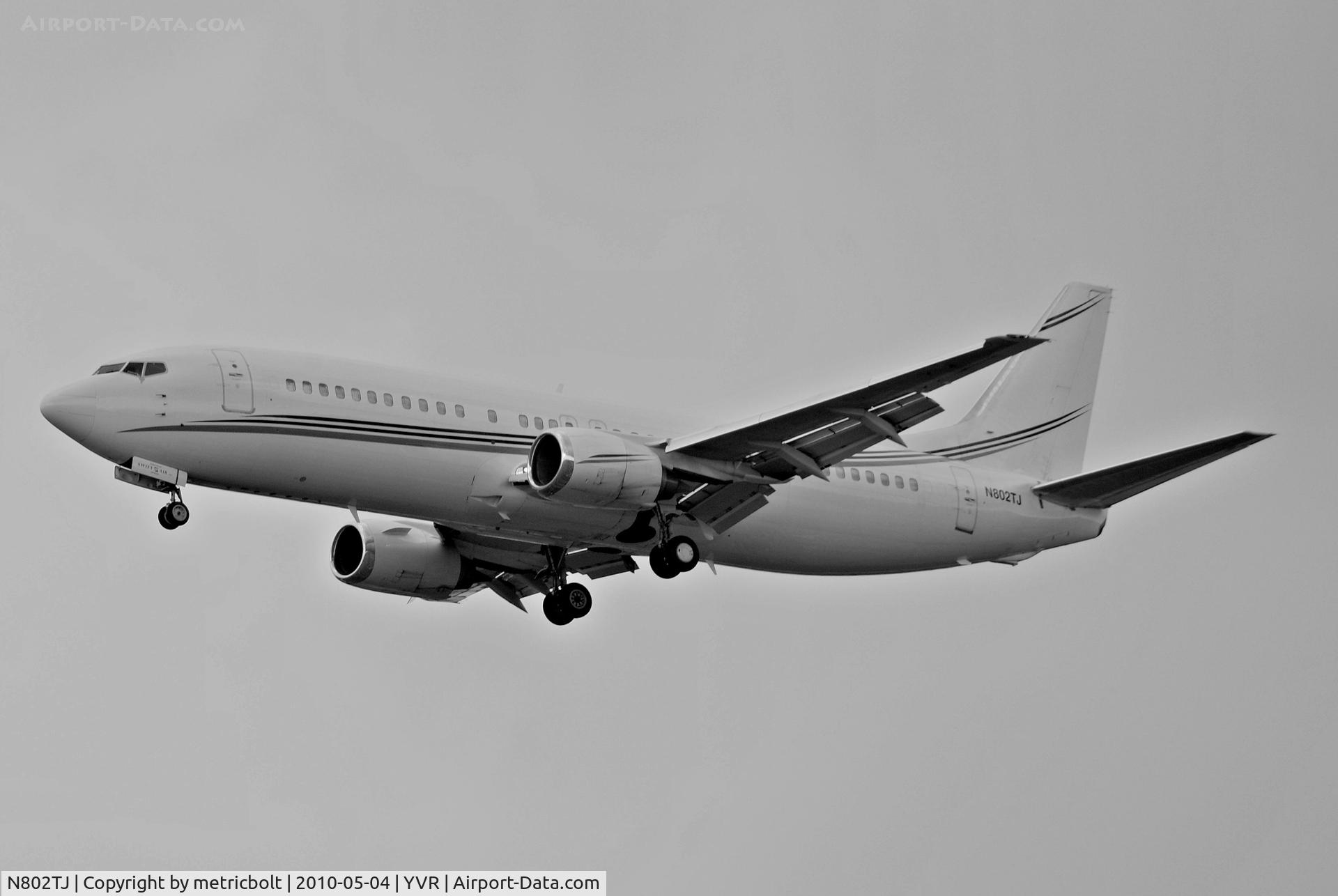 N802TJ, 1990 Boeing 737-4B7 C/N 24874, Landing at YVR. Operated by Swift Air