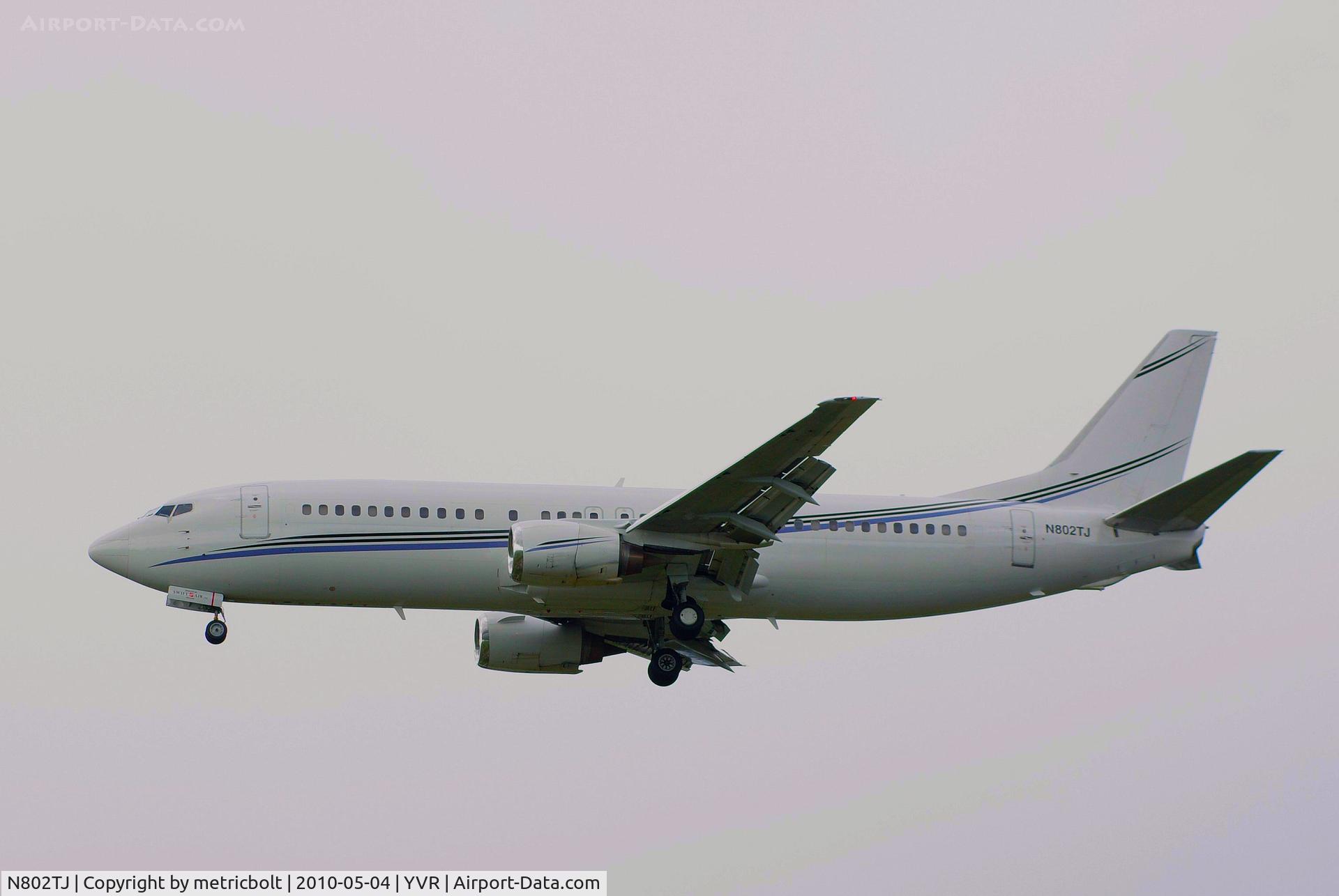 N802TJ, 1990 Boeing 737-4B7 C/N 24874, Landing at YVR. Operated by Swift Air