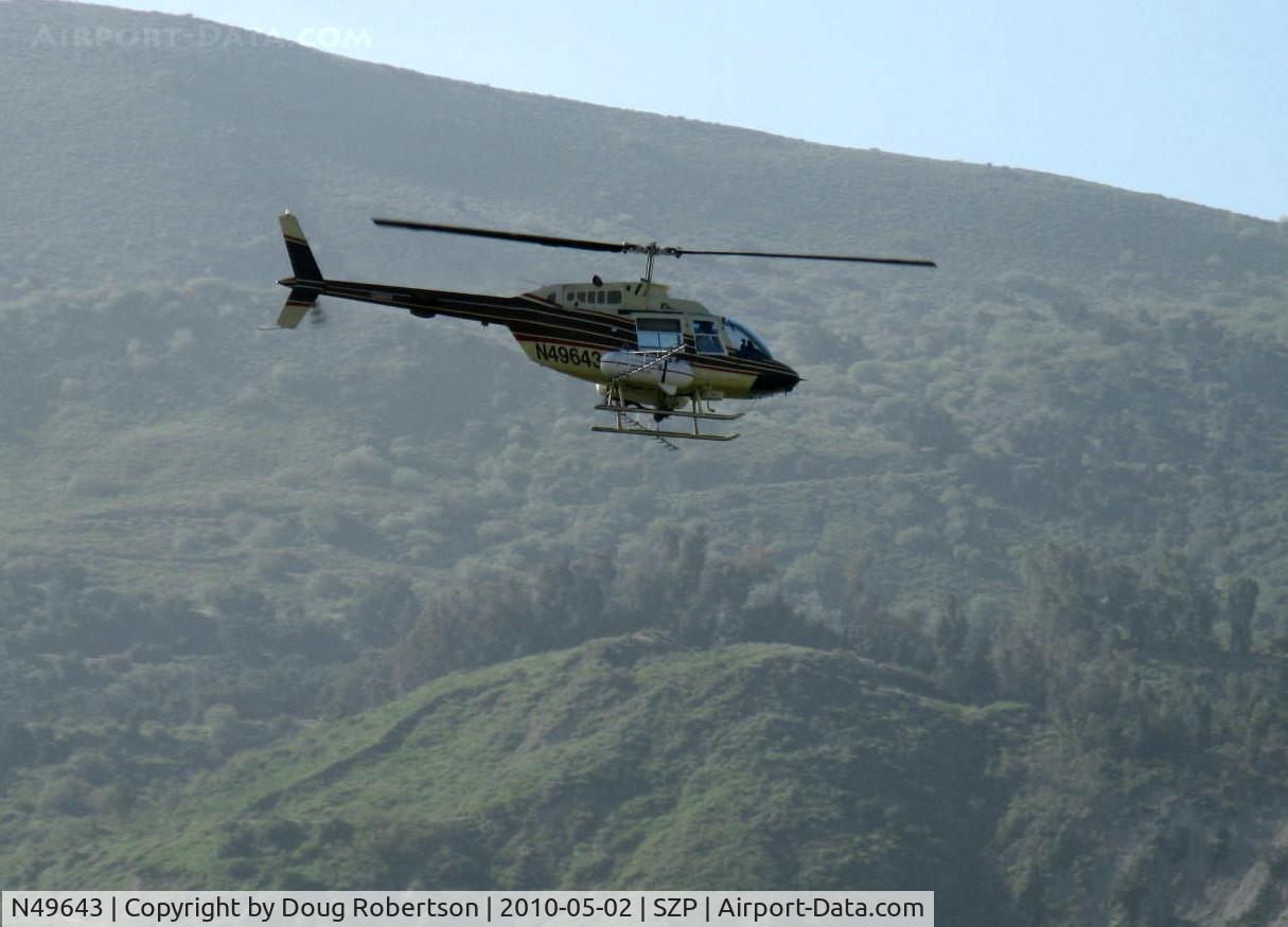 N49643, 1975 Bell 206B JetRanger C/N 1813, 1975 Bell 206B JETRANGER, one Allison 250-C20 turboshaft 420 shp for takeoff, 370 shp continuous, Restricted class with spray booms, ag applicator returning to OXR base via Santa Clara River route past SZP