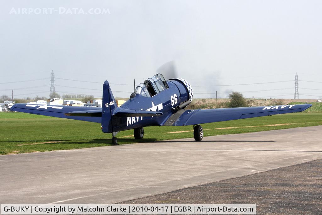 G-BUKY, 1952 Canadian Car & Foundry T-6H Harvard Mk.4M C/N CCF4-464, CCF T-6J Harvard Mk4 at Breighton Airfield, UK in 2010. An old favourite on the taxi track prior to take off for a demo at The Real Aeroplane Company,