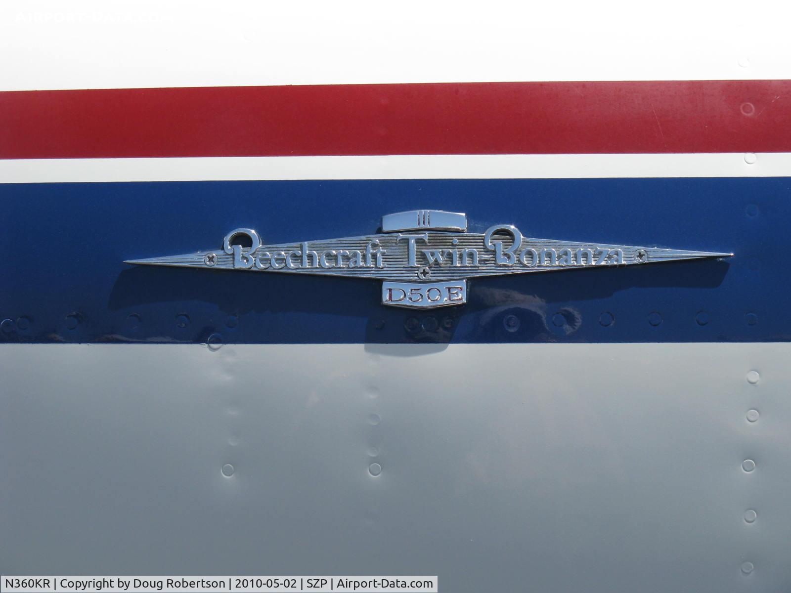 N360KR, 1961 Beech D50E Twin Bonanza C/N DH-320, 1961 Beech D50E TWIN BONANZA 'Miss Christine', two Lycoming GO-480-G2F6 295 Hp each, three-blade Hartzell props, logo
