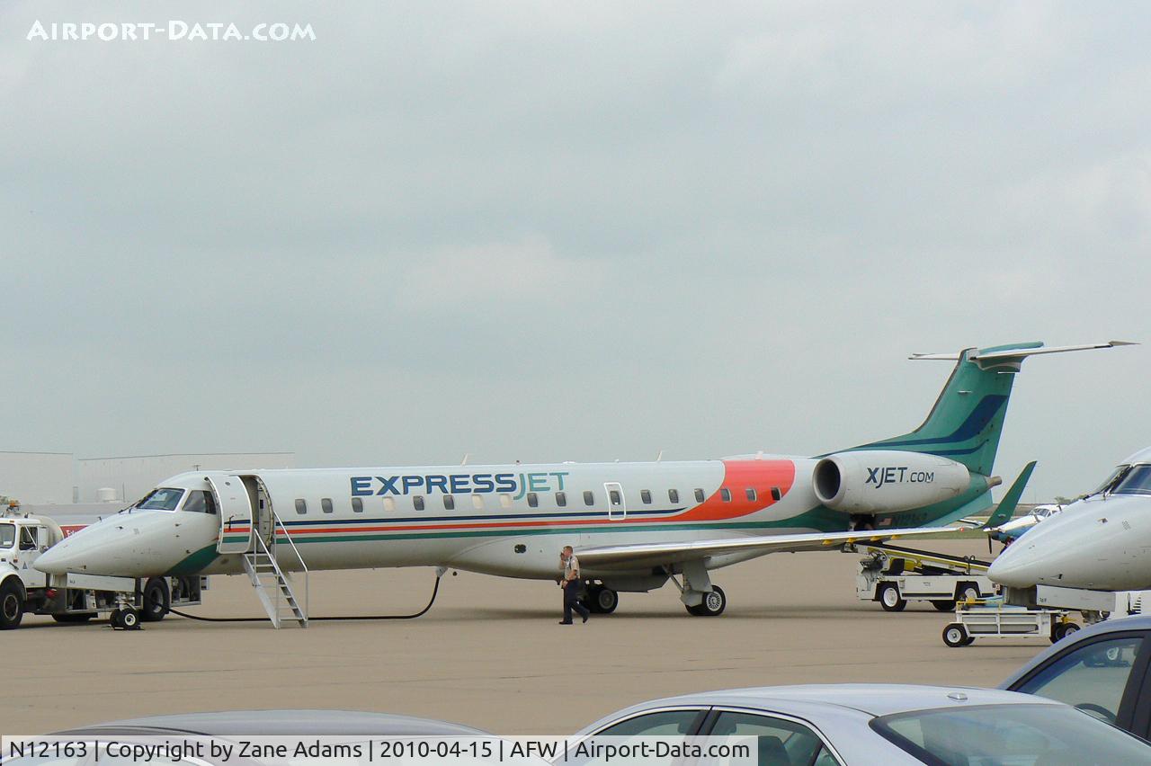 N12163, 2004 Embraer ERJ-145XR (EMB-145XR) C/N 14500811, At Fort Worth Alliance Airport - In town for NASCAR