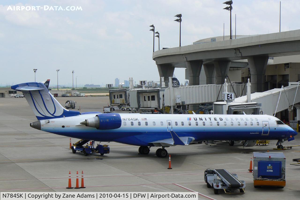 N784SK, 2009 Bombardier CRJ-700 (CL-600-2C10) Regional Jet C/N 10284, United Express at the gate - DFW Airport