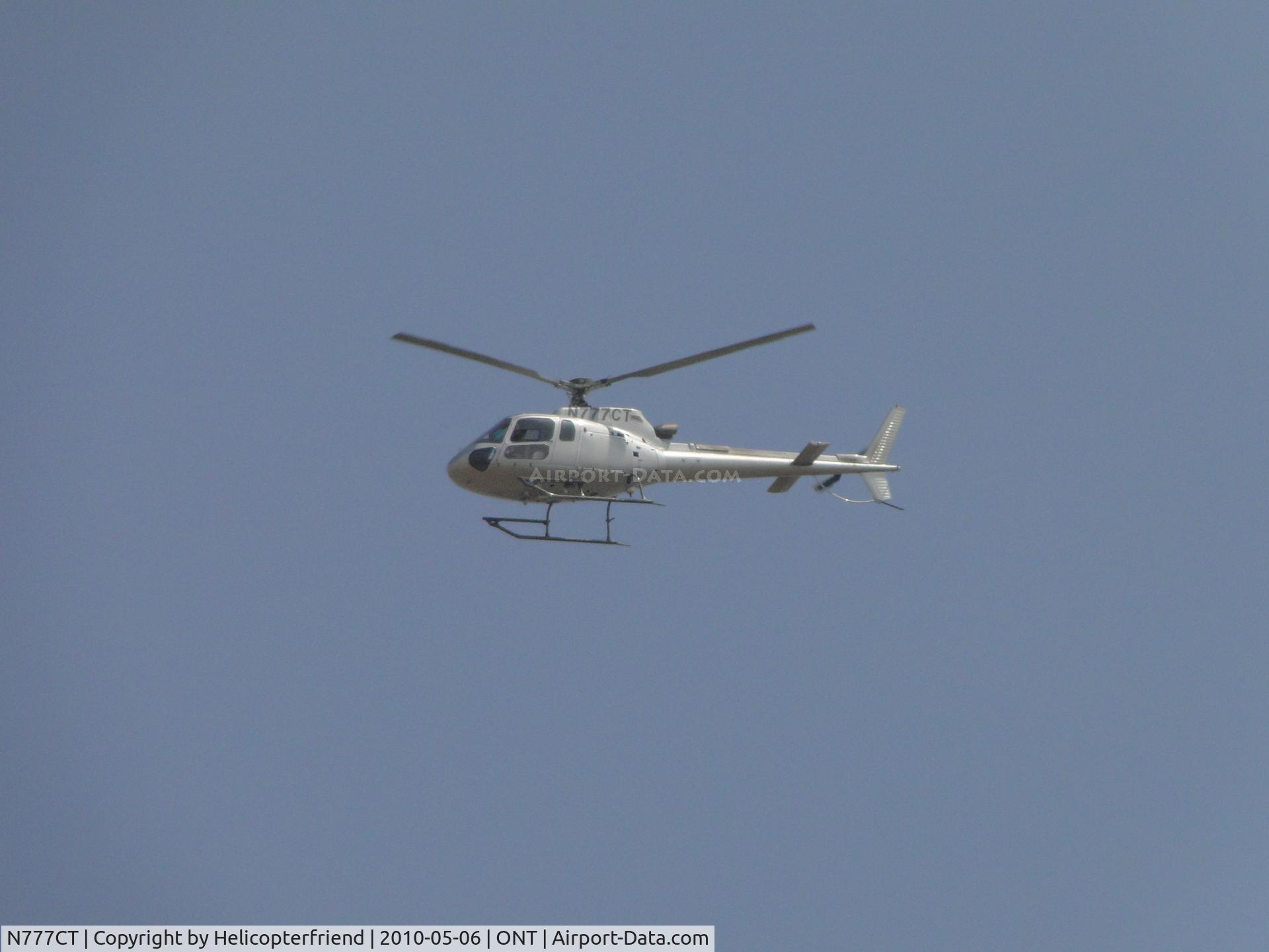 N777CT, 2001 Eurocopter AS-350B-3 Ecureuil Ecureuil C/N 3395, On final to runway 26R heading towards helicopter area, northside