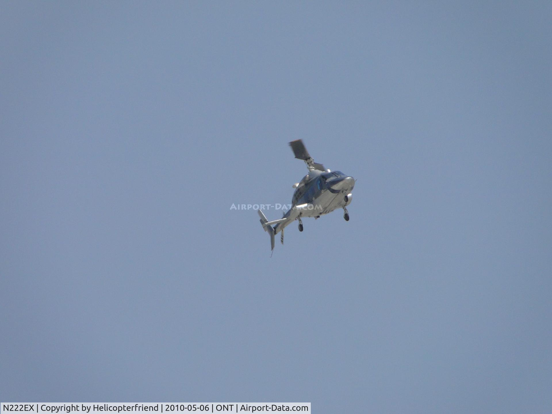 N222EX, 1980 Bell 222 C/N 47043, Turning final across runways for parking on southside