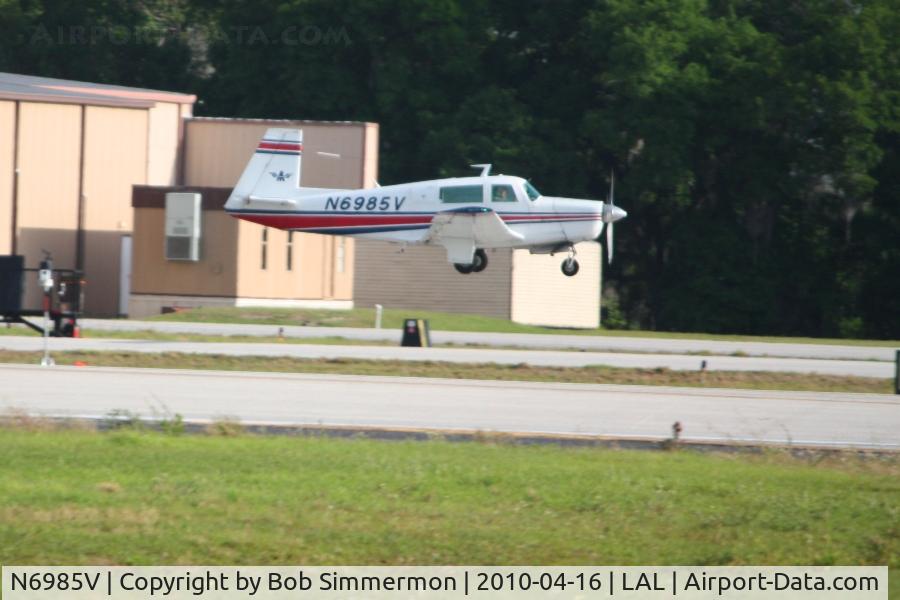N6985V, 1976 Mooney M20F Executive C/N 22-1347, Arriving at Lakeland, FL during Sun N Fun 2010.