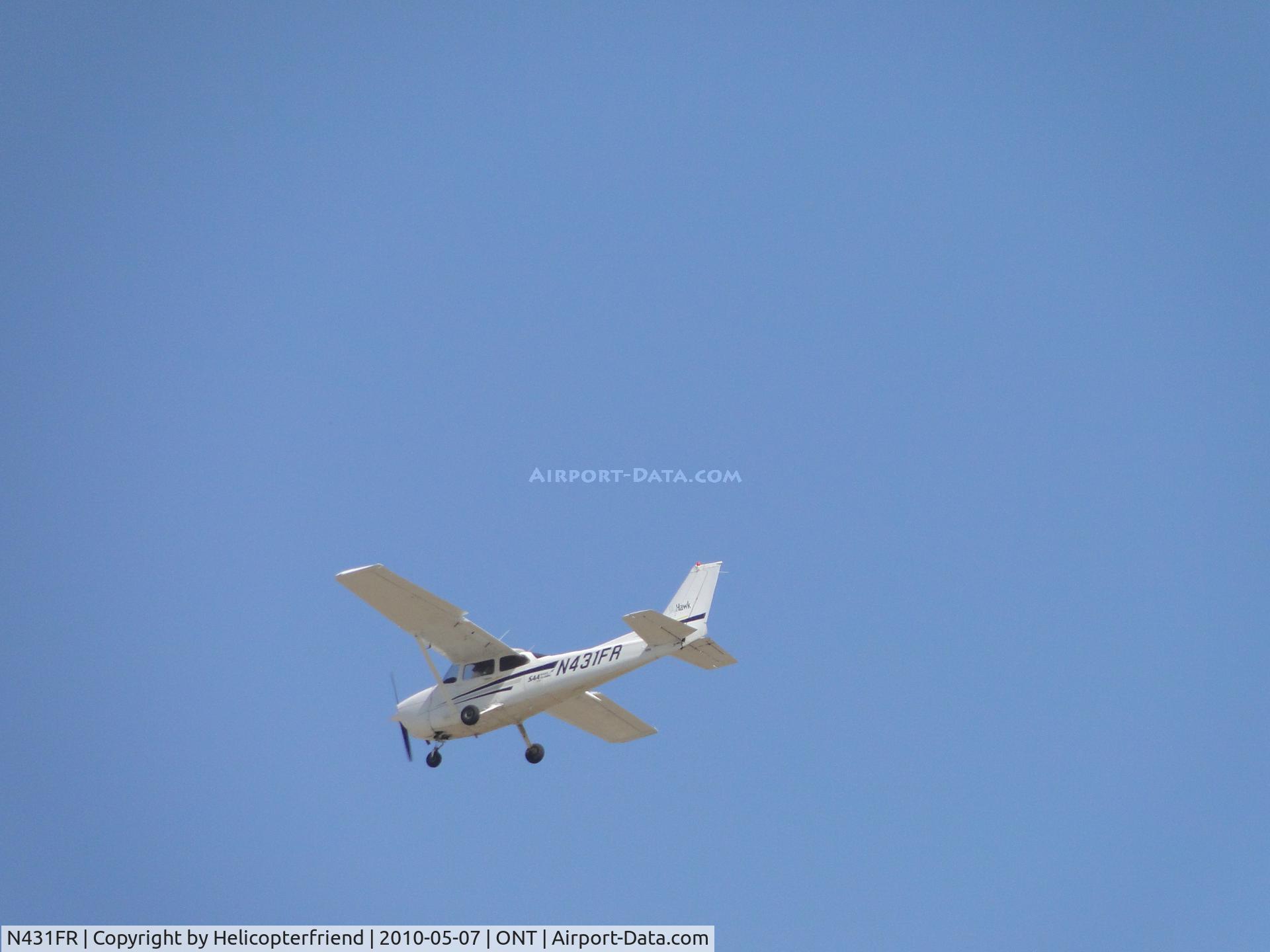 N431FR, 1997 Cessna 172R C/N 17280301, High approach on final to runway 26R