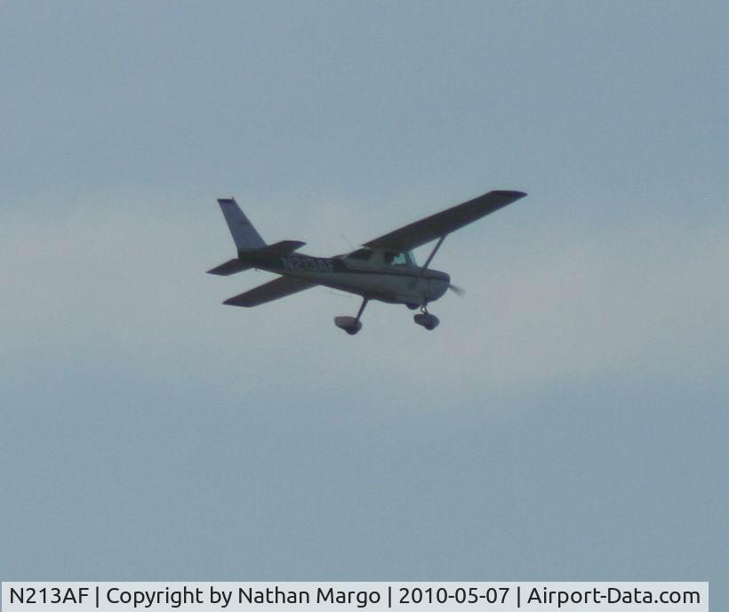 N213AF, 1975 Cessna 150M C/N 15077337, Seen flying over O.B. Pier, San Diego, CA