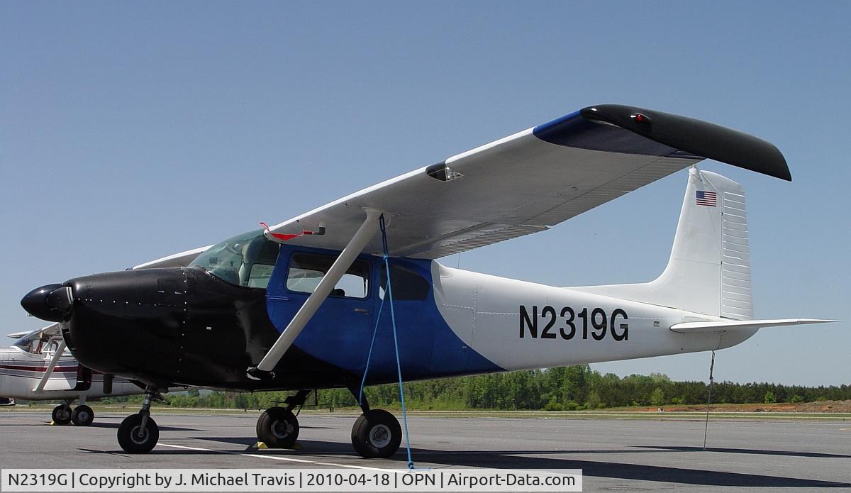 N2319G, 1958 Cessna 182B Skylane C/N 51619, New paint for N2319G.  On ramp at KOPN