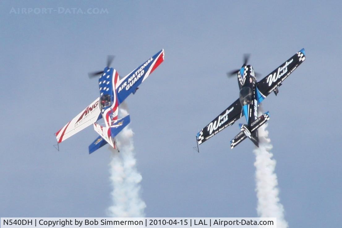 N540DH, 1995 Staudacher S-300D C/N 20, N540DH (L) & N540RH (R) performing at Sun N Fun 2010 - Lakeland, Florida