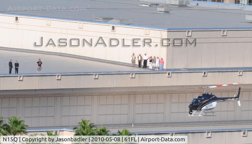 N15Q, Bell 206B JetRanger III C/N 2235, I shot this aircraft which was hovering around the Tampa Convention Center in downtown Tampa. I'm not sure what was going on, but I am assuming that some people were looking about buying this aircraft, but who knows.