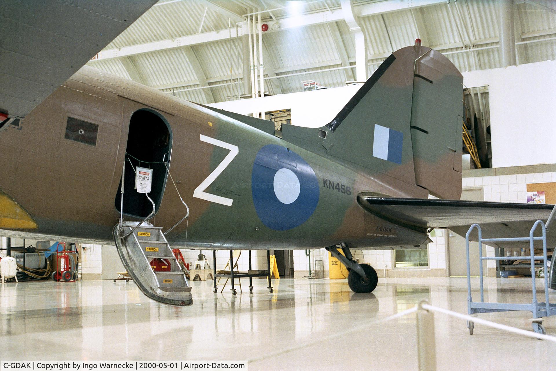 C-GDAK, 1939 Douglas DC-3-G202A C/N 2141, Douglas C-47 Dakota undergoing maintenance at the Canadian Warplane Heritage Museum, Hamilton Ontario