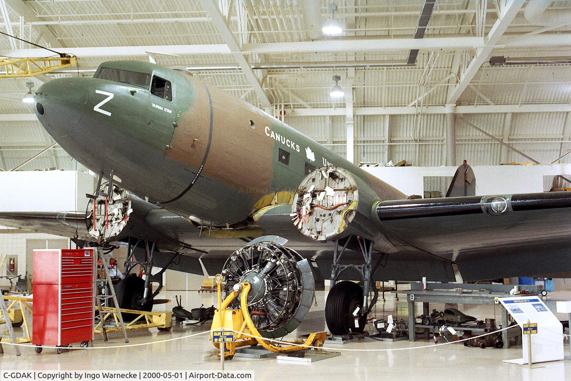 C-GDAK, 1939 Douglas DC-3-G202A C/N 2141, Douglas C-47 Dakota undergoing maintenance at the Canadian Warplane Heritage Museum, Hamilton Ontario