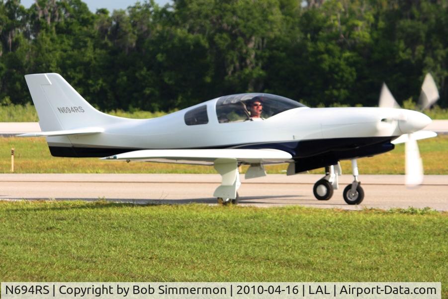 N694RS, 2006 Lancair 235/320 C/N 105, Departing Lakeland, FL during Sun N Fun 2010