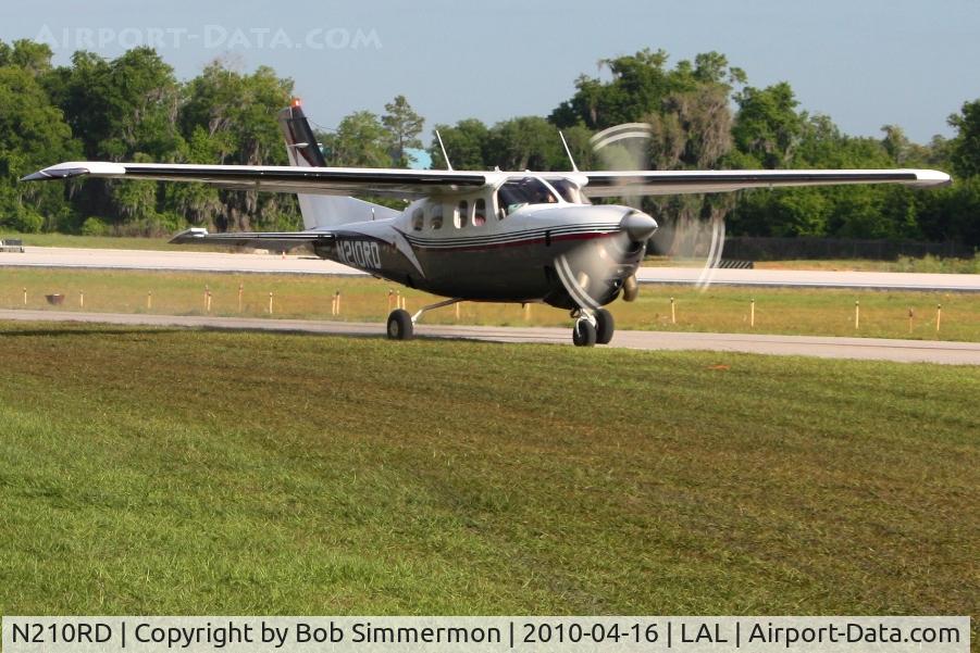 N210RD, 1981 Cessna P210N Pressurised Centurion C/N P21000772, Departing Lakeland, FL during Sun N Fun 2010