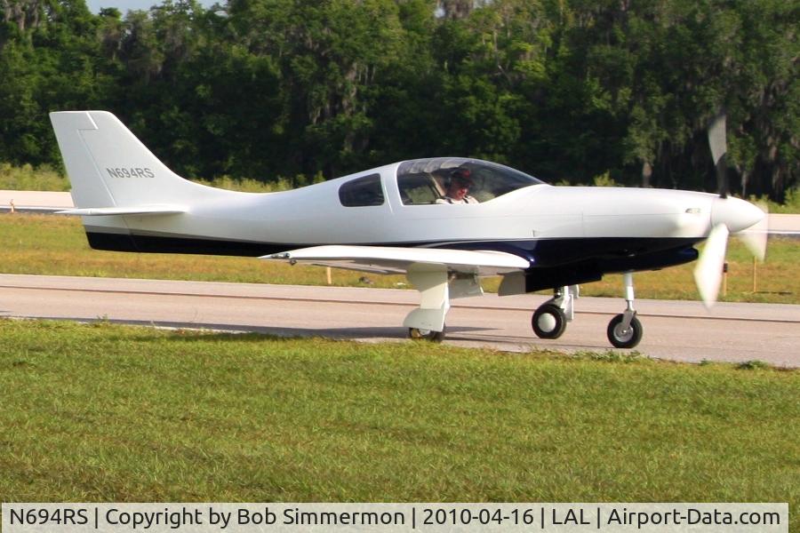 N694RS, 2006 Lancair 235/320 C/N 105, Departing Lakeland, FL during Sun N Fun 2010