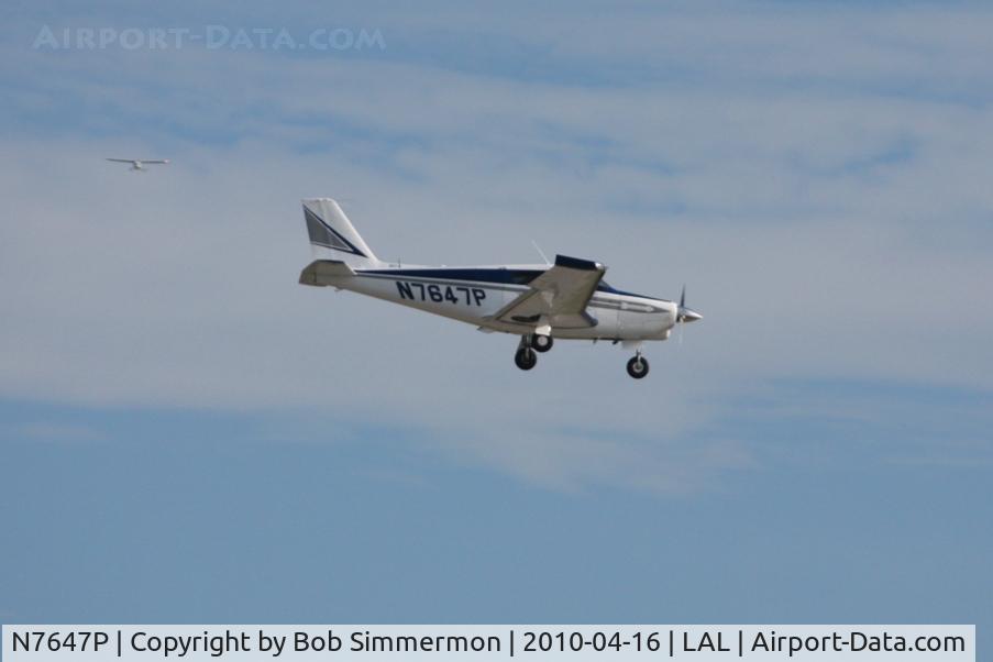 N7647P, 1961 Piper PA-24-180 Comanche C/N 24-2861, Arriving at Lakeland, FL during Sun N Fun 2010.