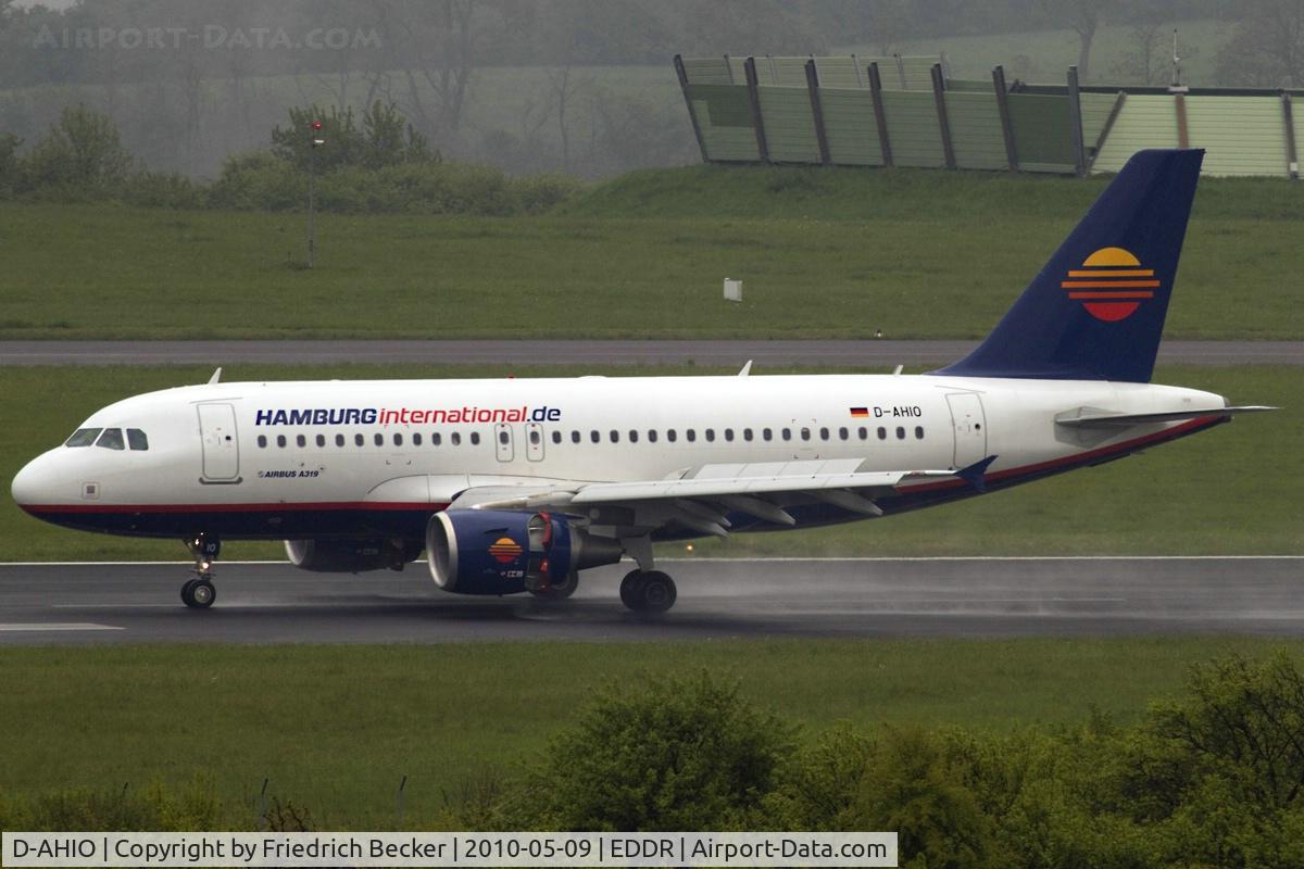 D-AHIO, 2009 Airbus A319-112 C/N 3872, decelerating after touchdown on a wet RW27