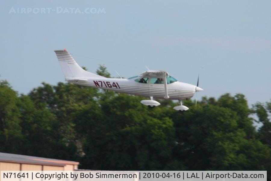 N71641, 1969 Cessna 182M Skylane C/N 18259701, Arriving at Lakeland, FL during Sun N Fun 2010.