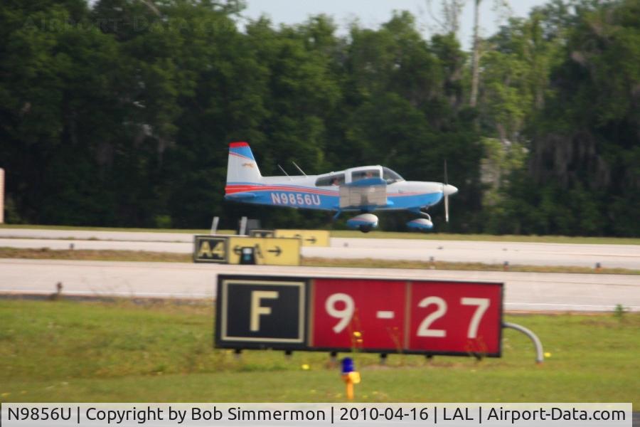 N9856U, 1976 Grumman American AA-5A Cheetah C/N AA5A0256, Arriving at Lakeland, FL during Sun N Fun 2010.