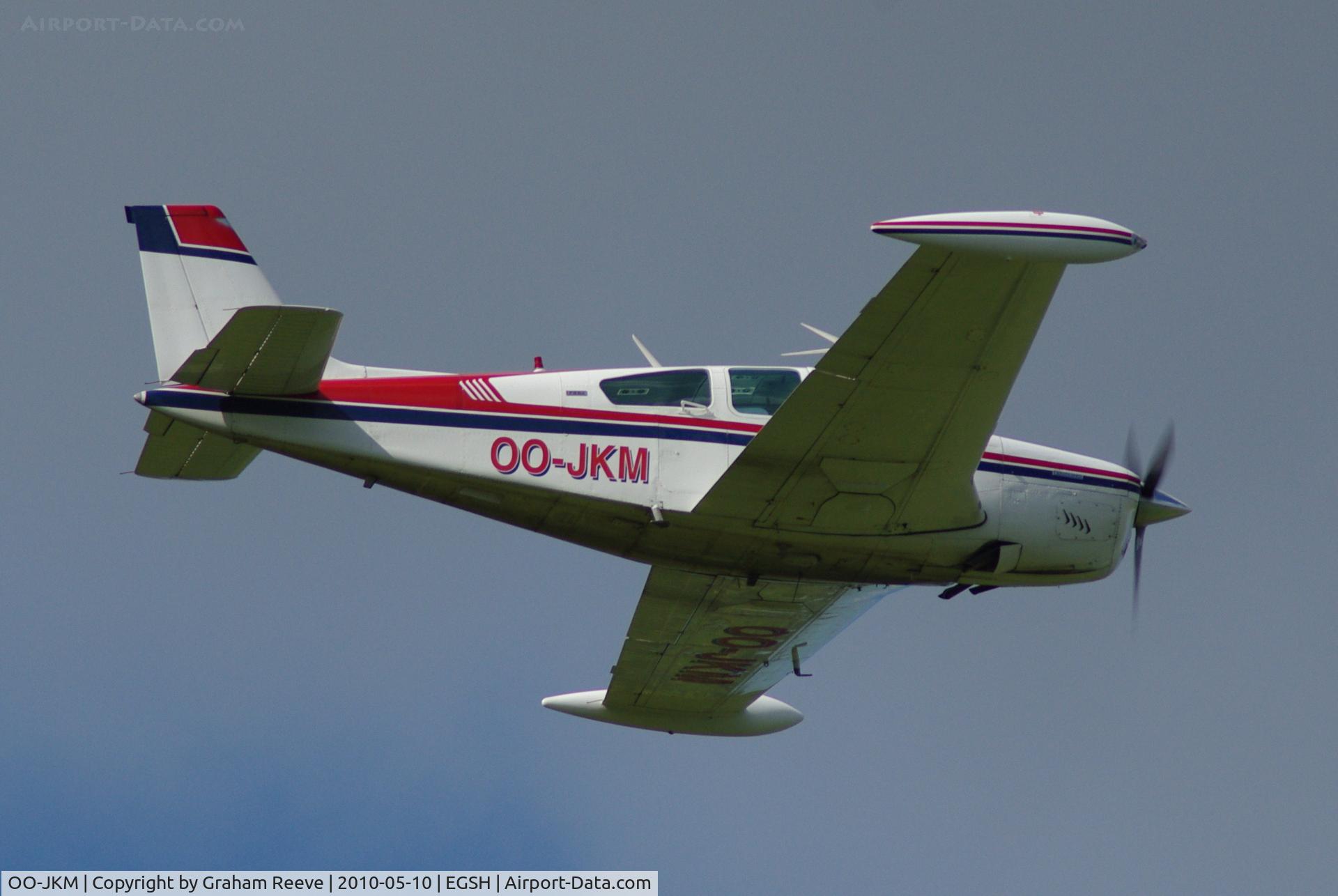 OO-JKM, 1974 Beech F33A Bonanza C/N CE487, Taking off from Norwich.