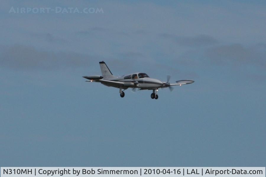 N310MH, 1981 Cessna 310R C/N 310R2132, Arriving at Lakeland, FL during Sun N Fun 2010.