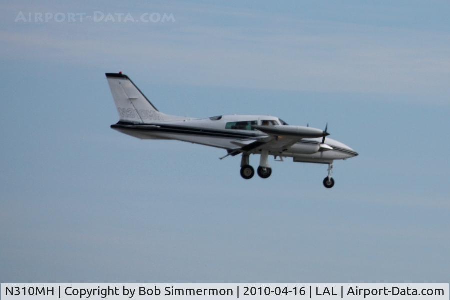 N310MH, 1981 Cessna 310R C/N 310R2132, Arriving at Lakeland, FL during Sun N Fun 2010.