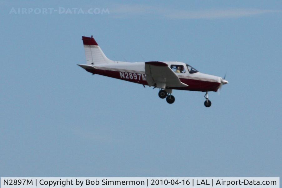 N2897M, 1977 Piper PA-28-161 Cherokee Warrior II C/N 28-7816323, Arriving at Lakeland, FL during Sun N Fun 2010.