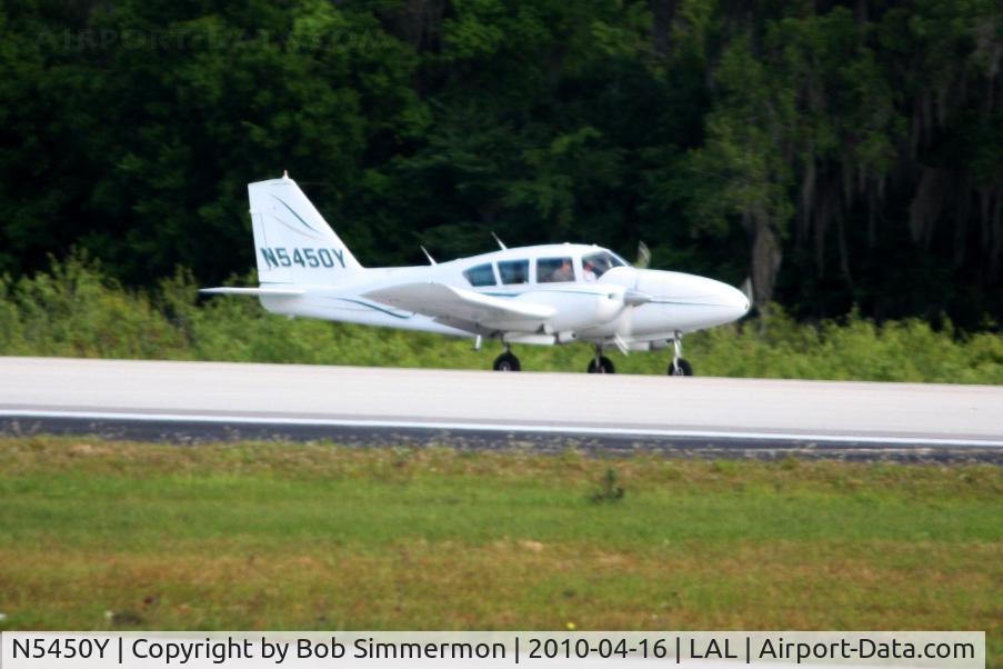 N5450Y, 1964 Piper PA-23-250 C/N 27-2532, Departing Lakeland, FL during Sun N Fun 2010