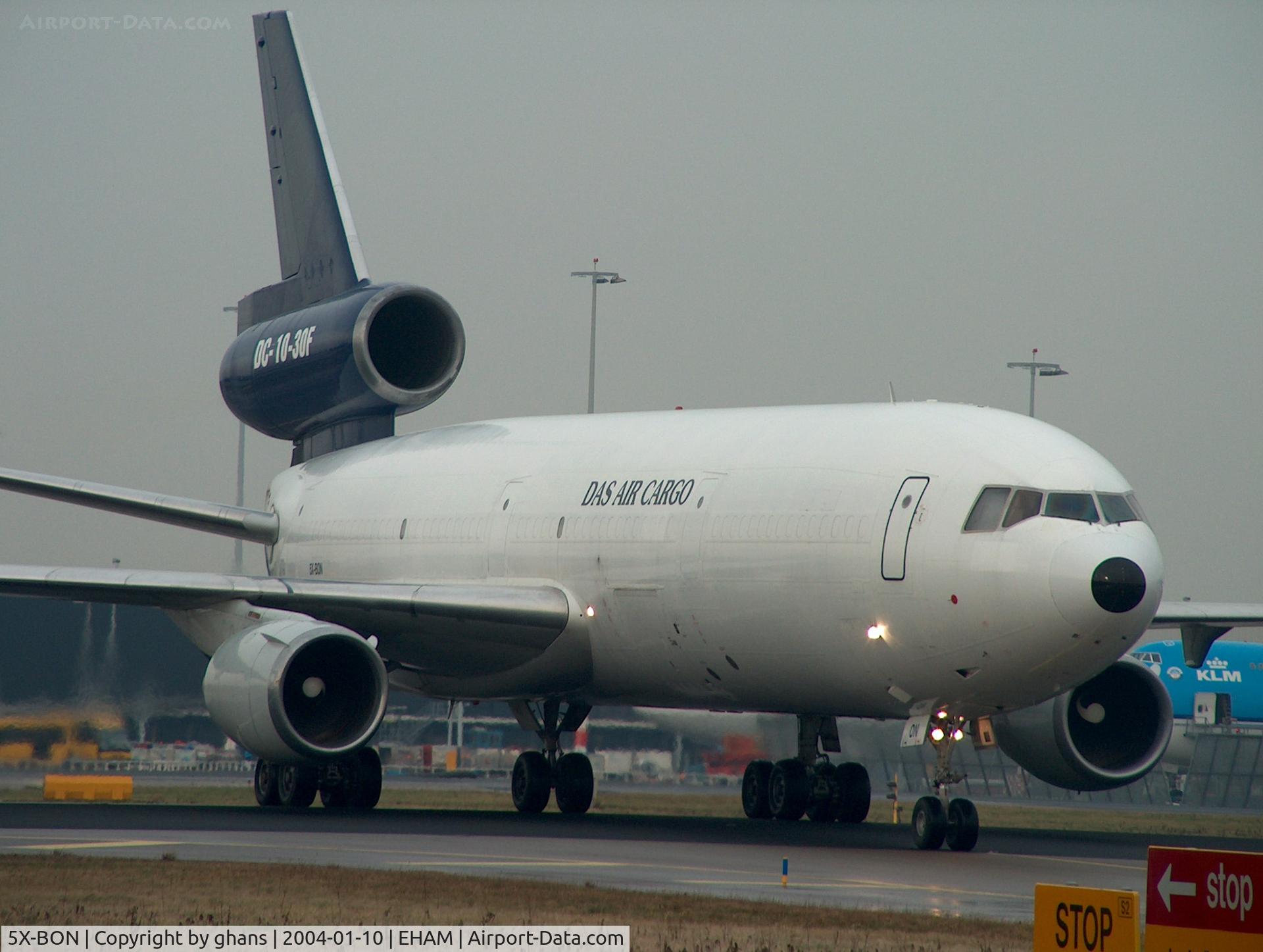 5X-BON, 1975 McDonnell Douglas DC-10-30F C/N 46921, Crossing Rw06 for the Sierre platform