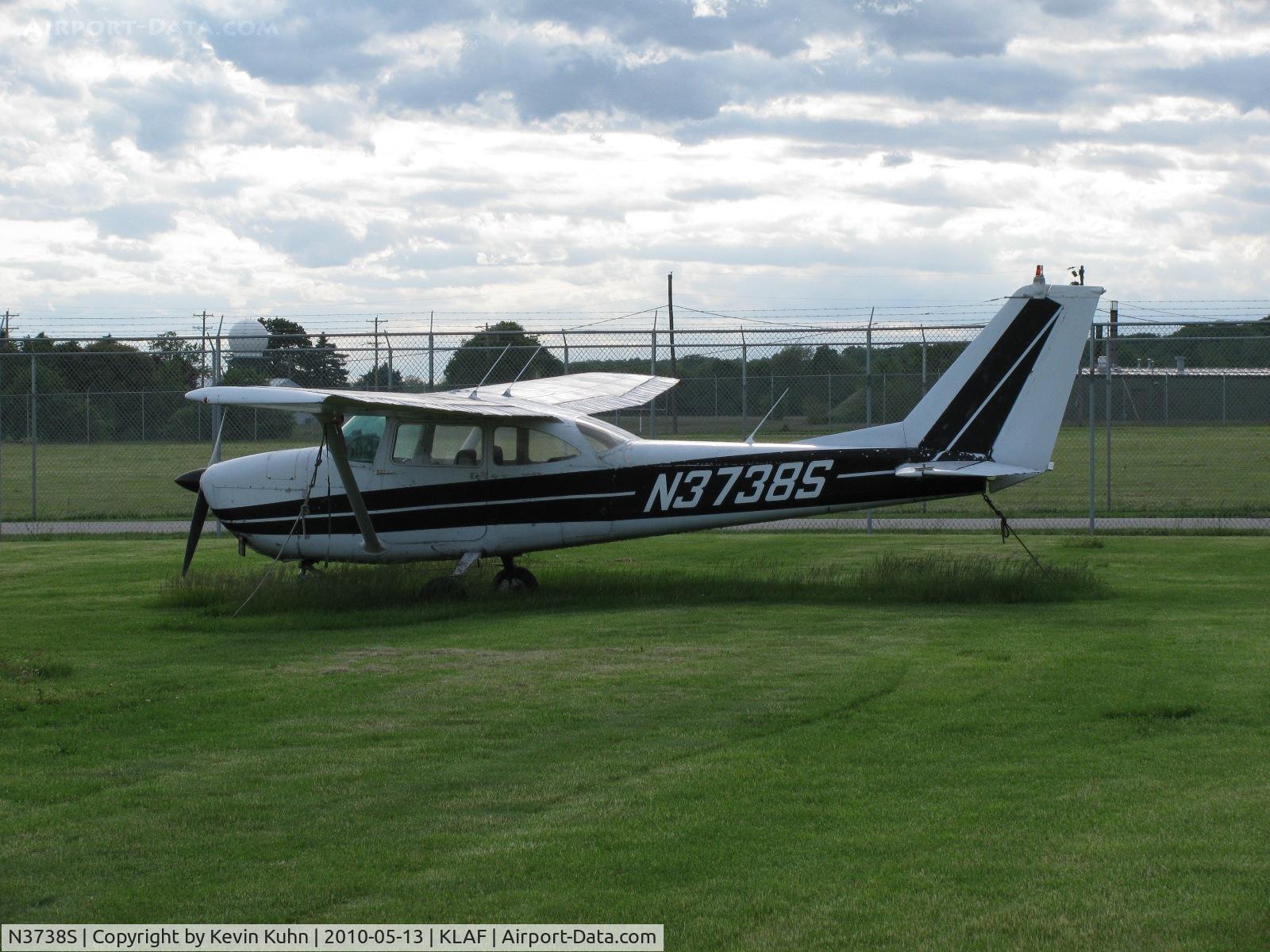 N3738S, 1963 Cessna 172E C/N 17250938, 63 Vintage 172 in the grass at Purdue's Airport. Thanks to my cousin and her friends for driving me over to see.
