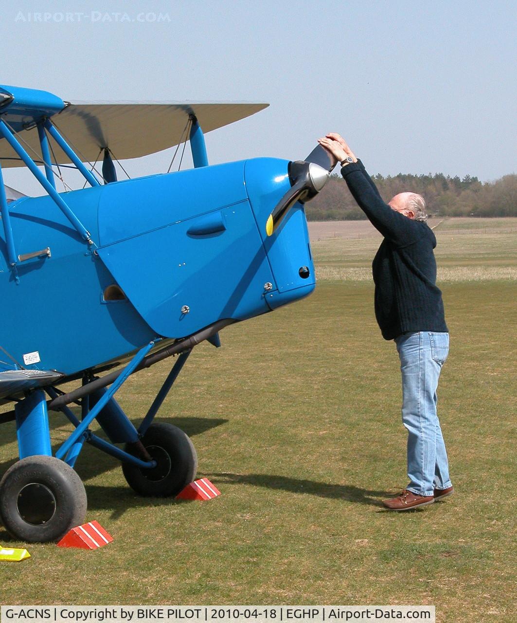 G-ACNS, 1934 De Havilland DH.60G-III Moth Major C/N 5068, GETTING THE PROP. SWUNG