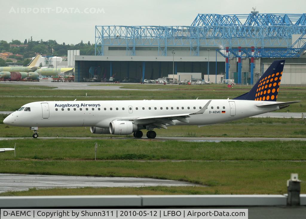 D-AEMC, 2009 Embraer 195LR (ERJ-190-200LR) C/N 19000300, Taxiing holding point rwy 32R for departure...