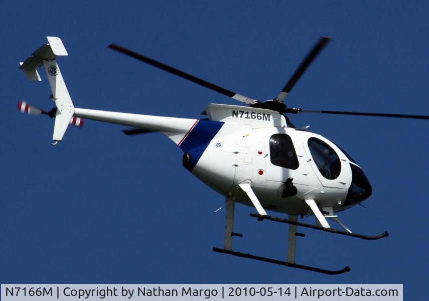 N7166M, Hughes 369E C/N 0145E, Seen flying over O.B. Pier, San Diego, CA