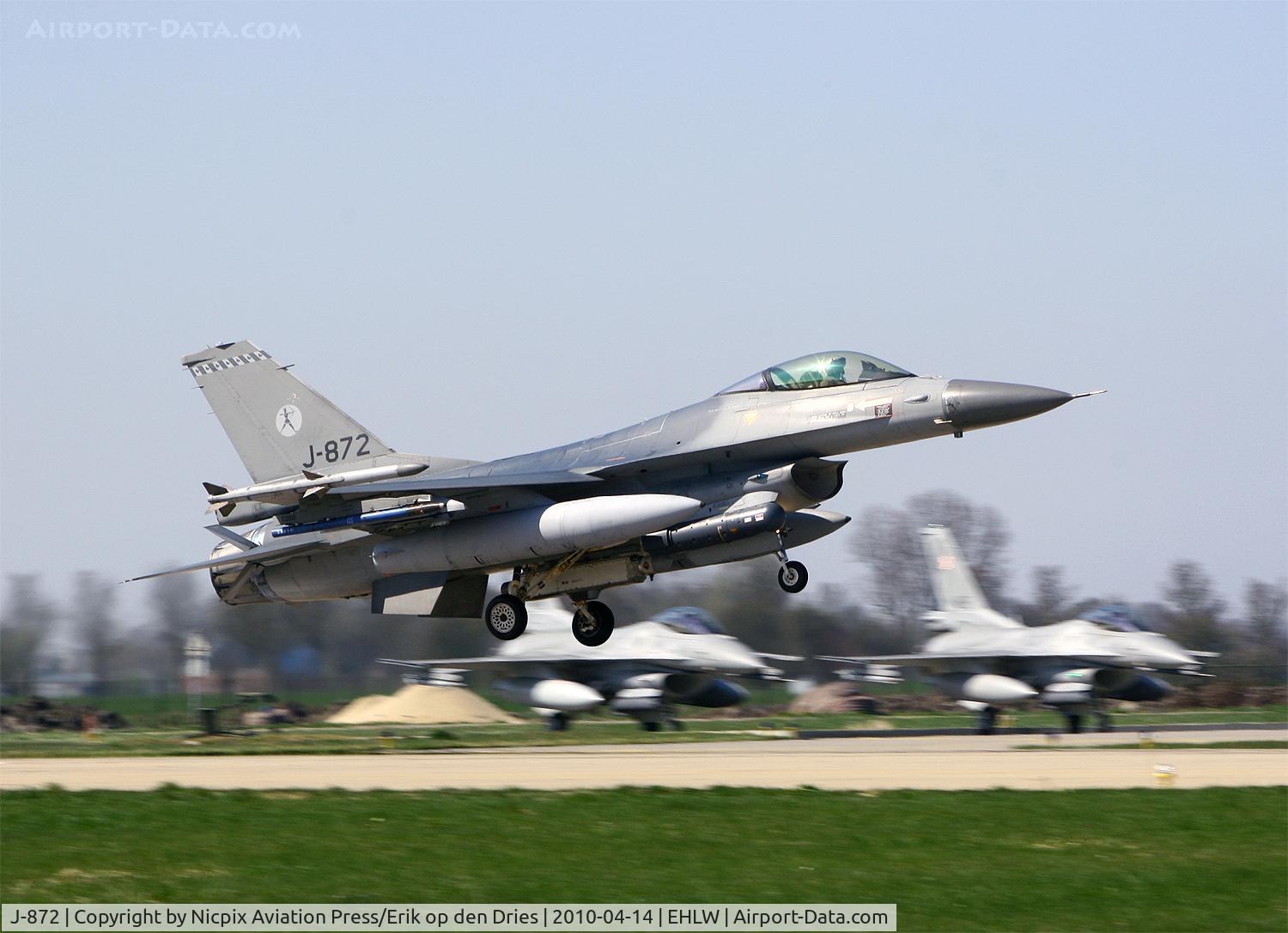 J-872, 1981 Fokker F-16AM Fighting Falcon C/N 6D-89, J-872, F-16AM of 322 sqn, is returning from a Frisian Flag 2010 mission at Leeuwarden AB, The Netherlands, while two Polish AF F-16's are waiting to start their mission