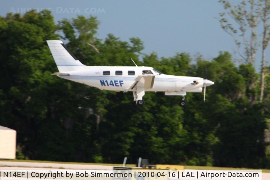 N14EF, 1988 Piper PA-46-350P Malibu Mirage C/N 4622009, Arriving at Lakeland, FL during Sun N Fun 2010.