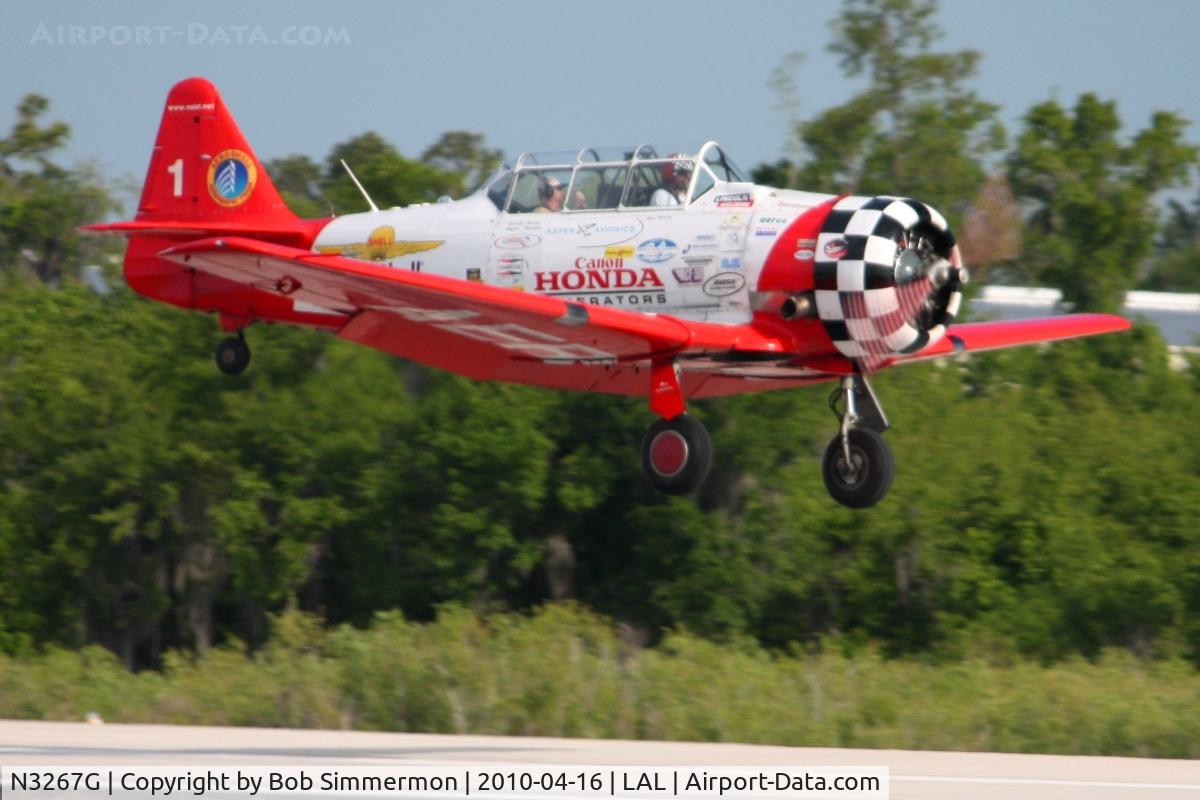 N3267G, 1943 North American SNJ-5 Texan C/N 88-15114, Landing on 9 during Sun N Fun 2010 at Lakeland, FL.