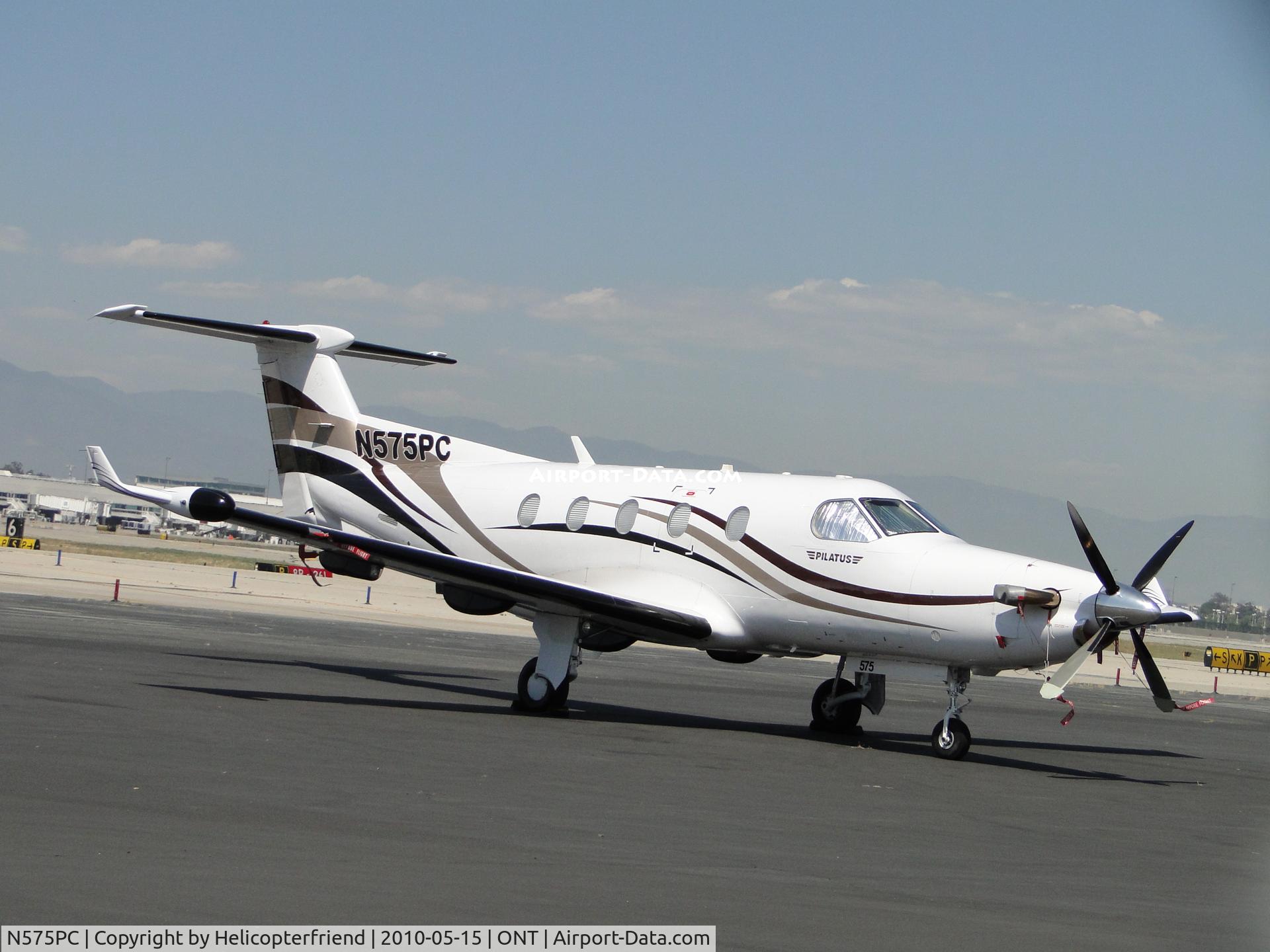 N575PC, 2004 Pilatus PC-12/45 C/N 575, Parked at Ontario