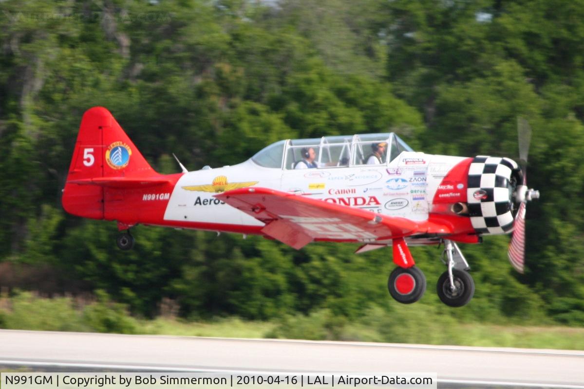 N991GM, 1941 North American AT-6C Texan C/N 88-17575, Landing on 9 during Sun N Fun 2010 at Lakeland, FL.