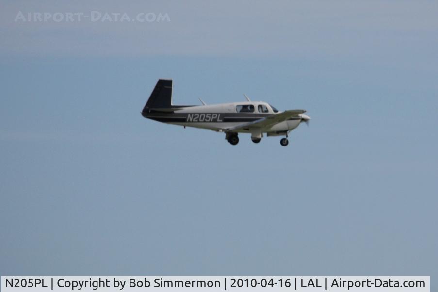 N205PL, 1987 Mooney M20J 201 C/N 24-3020, Arriving at Lakeland, FL during Sun N Fun 2010.