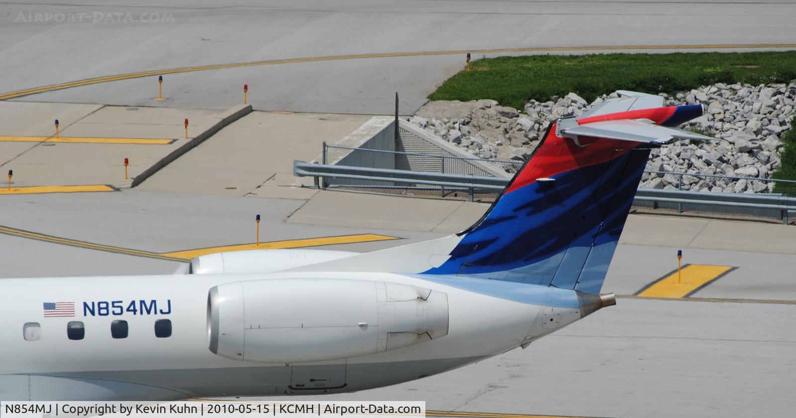 N854MJ, 2002 Embraer ERJ-145LR (EMB-145LR) C/N 145490, Tail detail as she pushes back from the gate for the flight back to KCVG